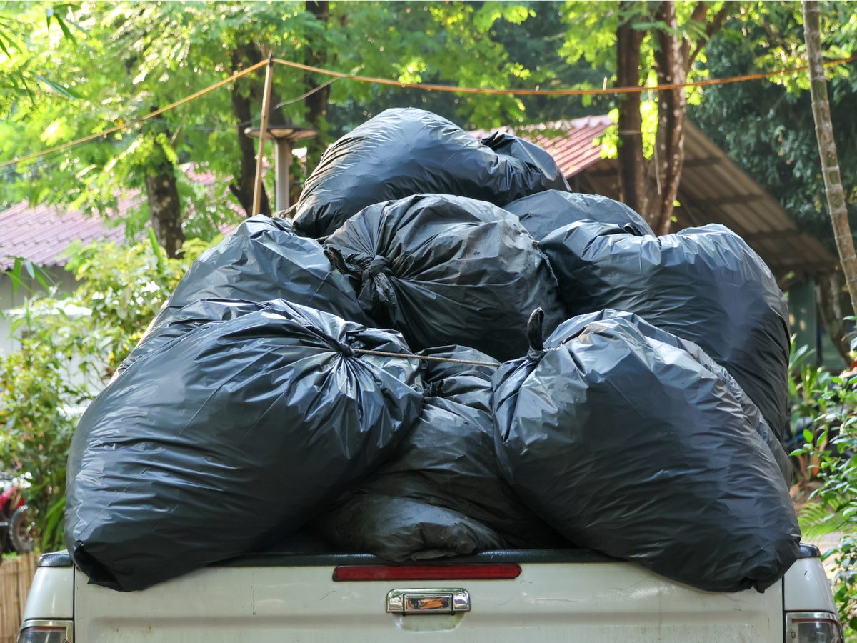 Truck loaded with bagged yard waste for a dump run